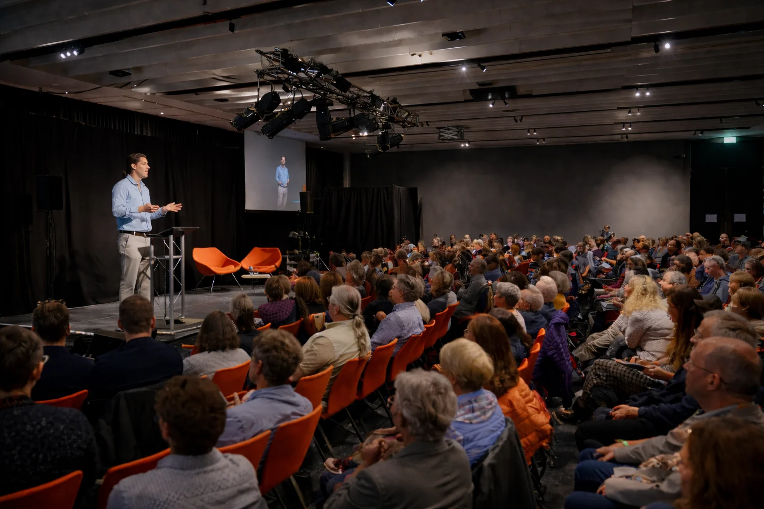 Audience attending a public talk event filmed by WTF Media